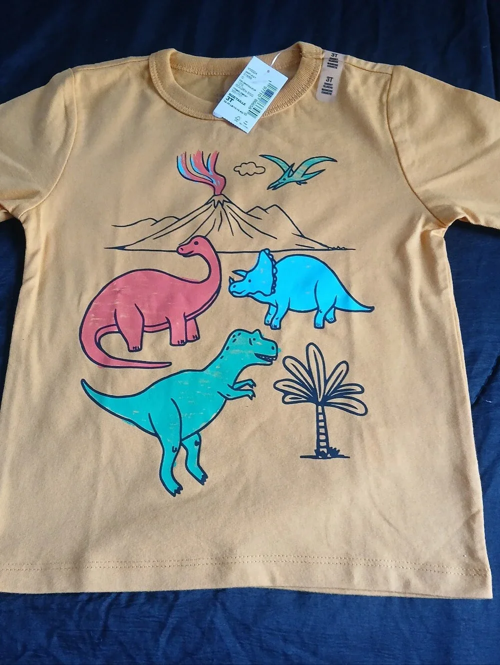 The Children's Place Yellow Short Sleeve Tee with Colorful Dino Print.